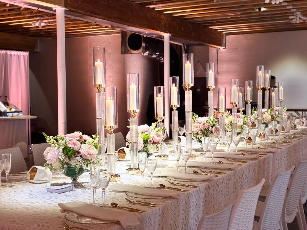 Event hall glowing with warm uplighting